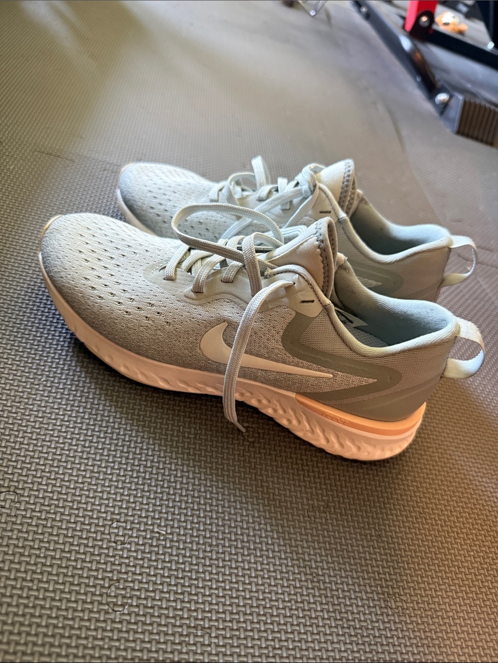 Nike Women's Gray Athletic Running Shoes with Pink Accent